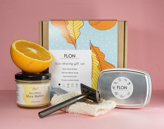 A beautifully made Ecofriendly Shaving Gift Set with FLON oranges, a toothbrush, and a razor - the perfect gift.