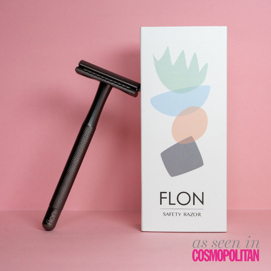 The FLON's Single 2.0 Reusable Long Safety Razor on a pink background, perfect for skincare routine.