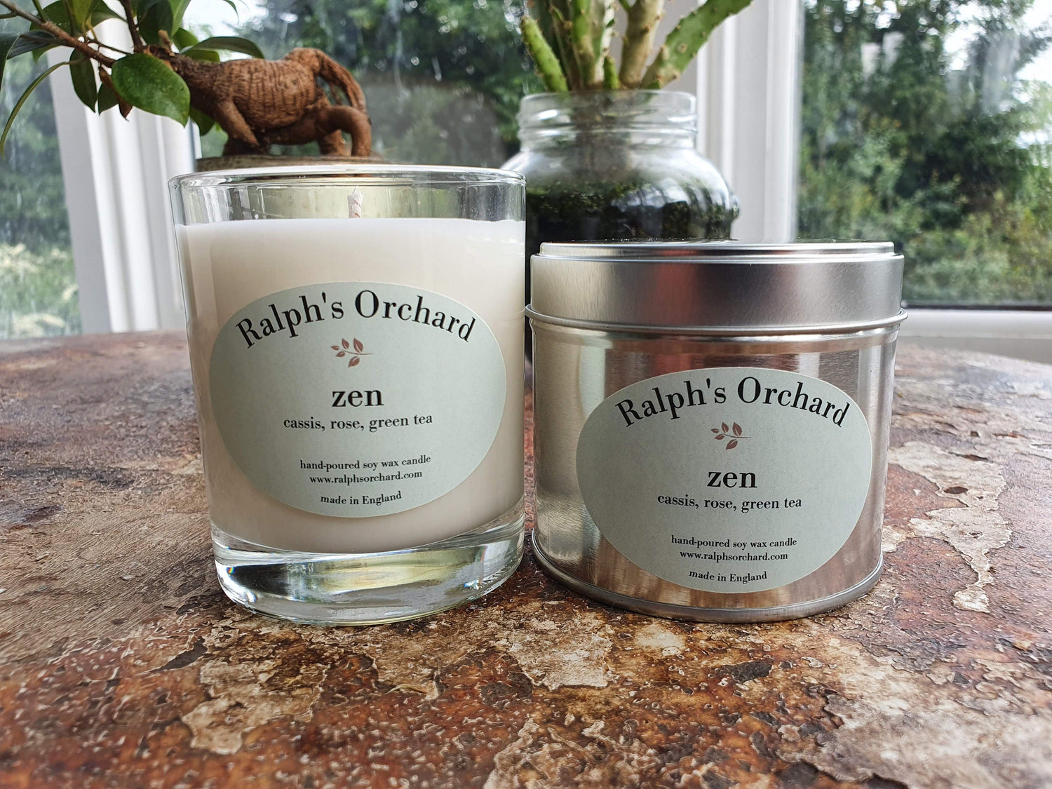 Zen candles in glass and silver tin