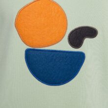 Pastel mint green balance stones sweatshirt with a soft feel.