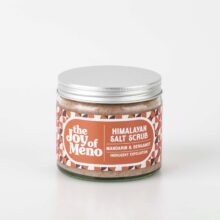 photo of a clear glass jar containing a pink coloured salt scrub for menopausal dry skin