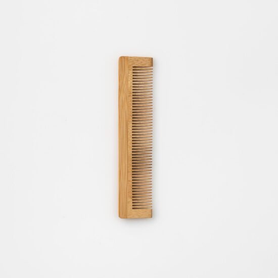 A Bristolmade bamboo comb with smooth, evenly spaced teeth, crafted from sustainable bamboo and designed for gentle hair care.