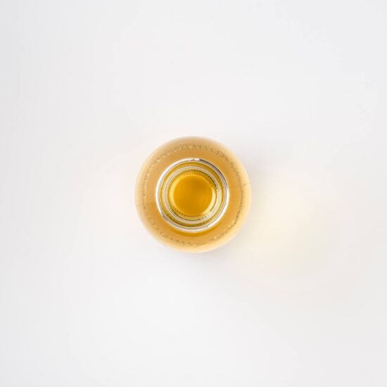 Top view of Bristolmade body oil, a rich, golden coloured oil, for use all over the body.