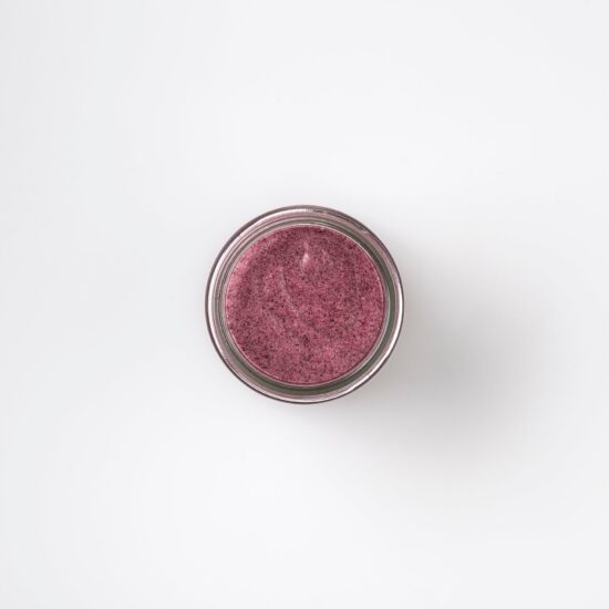 the top view of Bristolmade Beetroot face scrub, showing the deep pink, natural ingredients and the exfoliating particles.