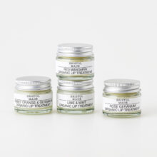 an image of four different Bristolmade lip balms, in 15ml clear glass jars, with white labels and black text, showing the different scents and ingredients of each product.