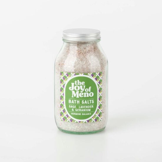 Sage, lavender and geranium bath salts. Pe pink from the blend of Epsom and Himalayan salts. In a 500ml clear glass jar with a green and purple label with white text.