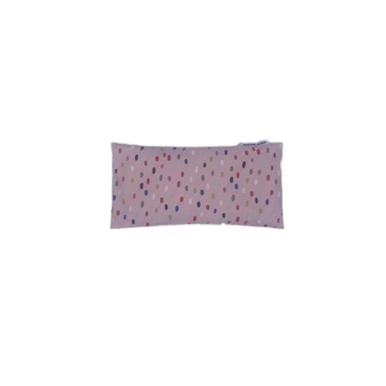 Photo of a pale pink cotton covered eye pillow with various coloured spots on.