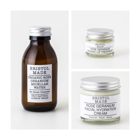 Skincare gift set containing three products, in glass packing. Products included are a micellar water for cleaning the skin, a moisturiser and lip balm. All with rose geranium essential oil as the fragrance.