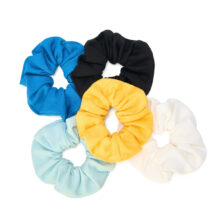 Set of five colorful zero waste scrunchies made from GOTS certified organic cotton and biodegradable elastane, eco-friendly and sustainable hair accessories by Wellicious.