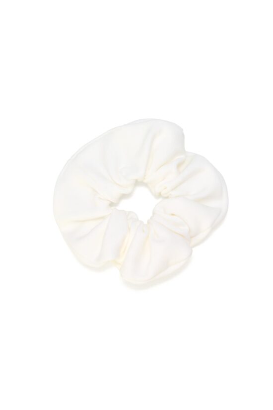 Sustainable white scrunchie crafted from biodegradable, Cradle to Cradle Certified® fabric by Wellicious – a zero-waste, eco-conscious hair accessory