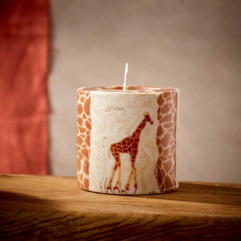 Fair trade giraffe candle with giraffe image in the wax using the millifiore technique