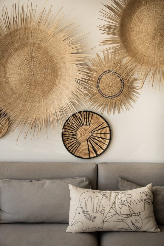 Handwoven sun discs make for stunning statement wall decor