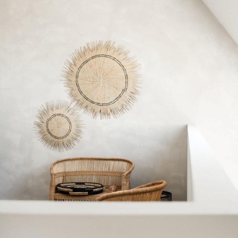 Ethically sourced natural sun disc with a black stripe for stunning statement wall decor