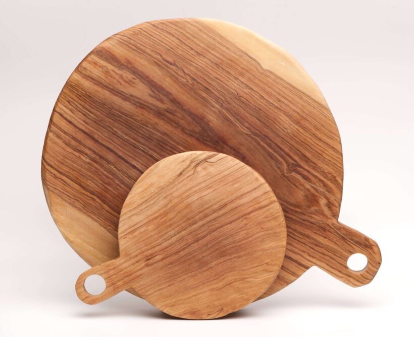 round olive wood chopping boards in 2 sizes with short handle