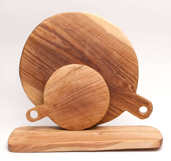 A picture showcasing the different sized and shaped olive wood chopping boards available